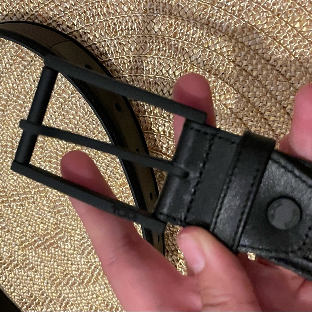 TUMI kids belts black leather